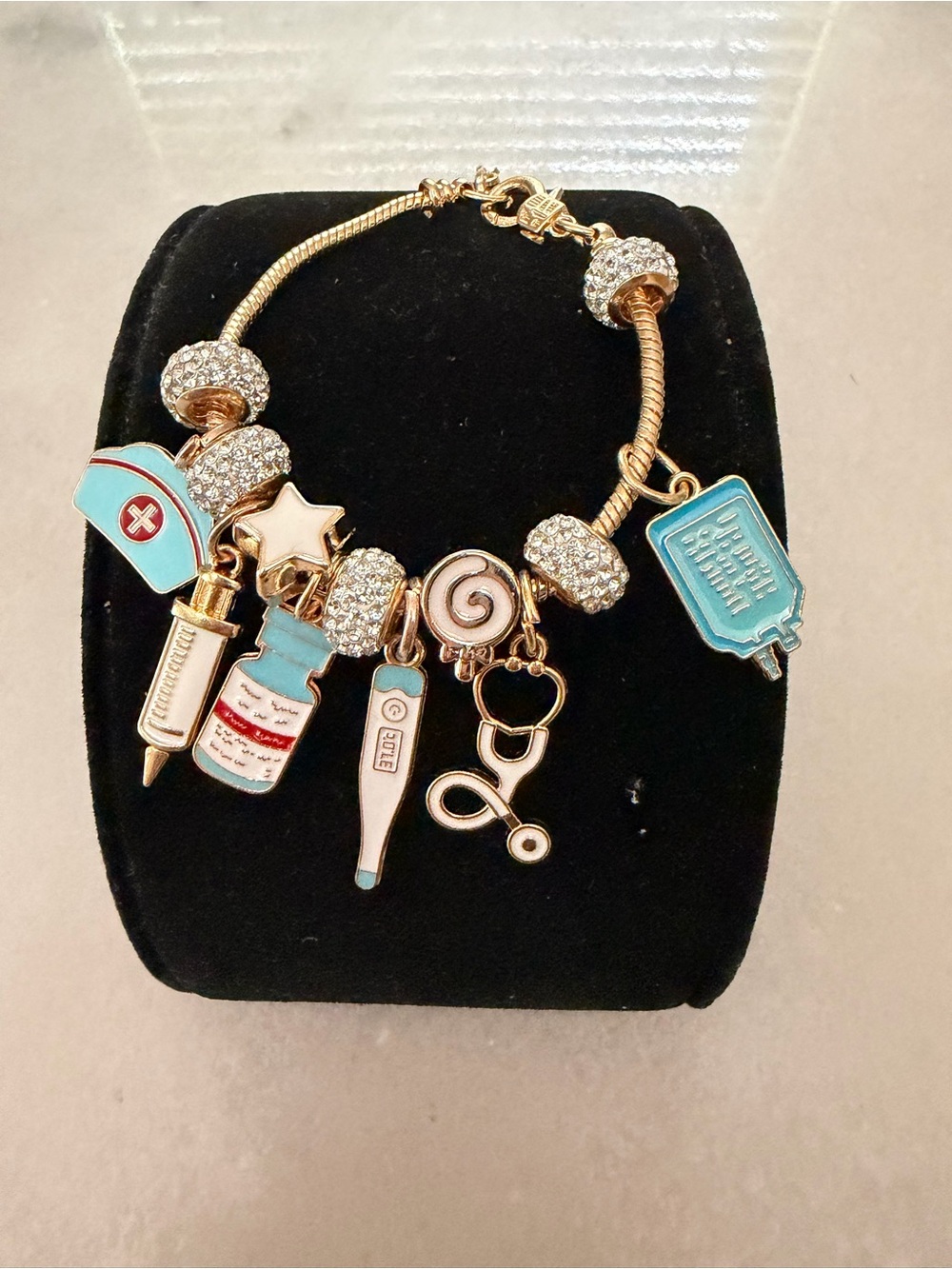 Gold-Tone Medical Bracelet with Blue Accents